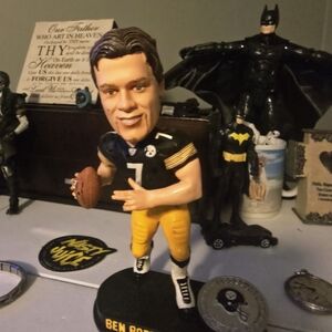 Dynamic Sports Ceramic Figurine in Yellow and Black